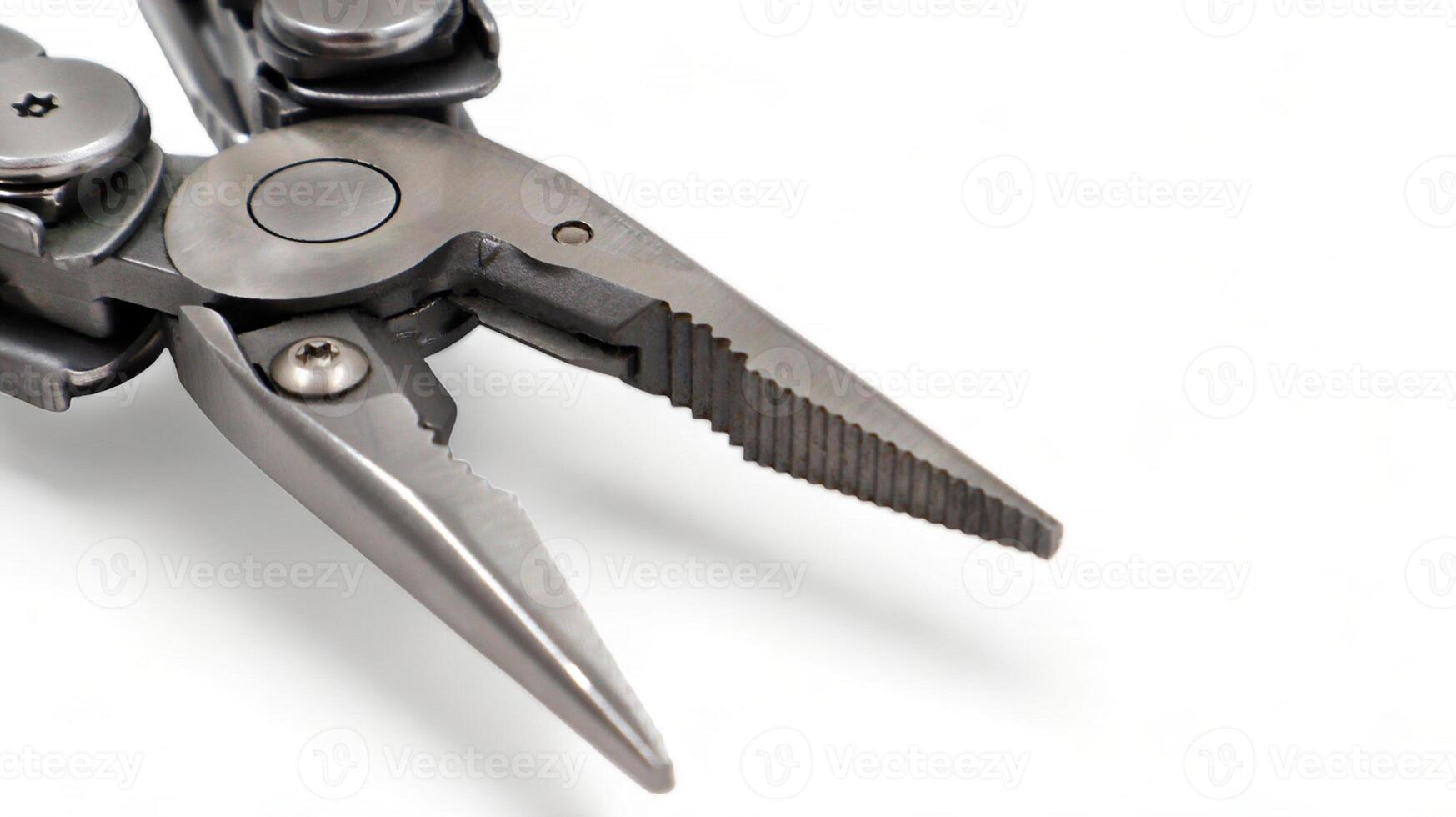 One modern gray iron open folding multifunctional knife on a white background. Multi-tool with advanced tools. Pliers close up. Compact and portable product. Pocket knife. EDC concept. Copy space. photo