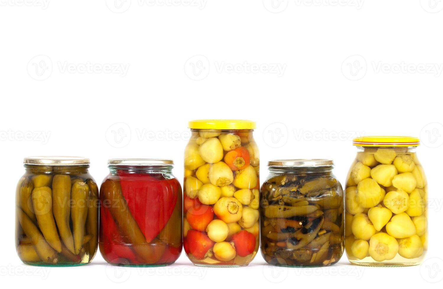 Preserved peppers on white photo