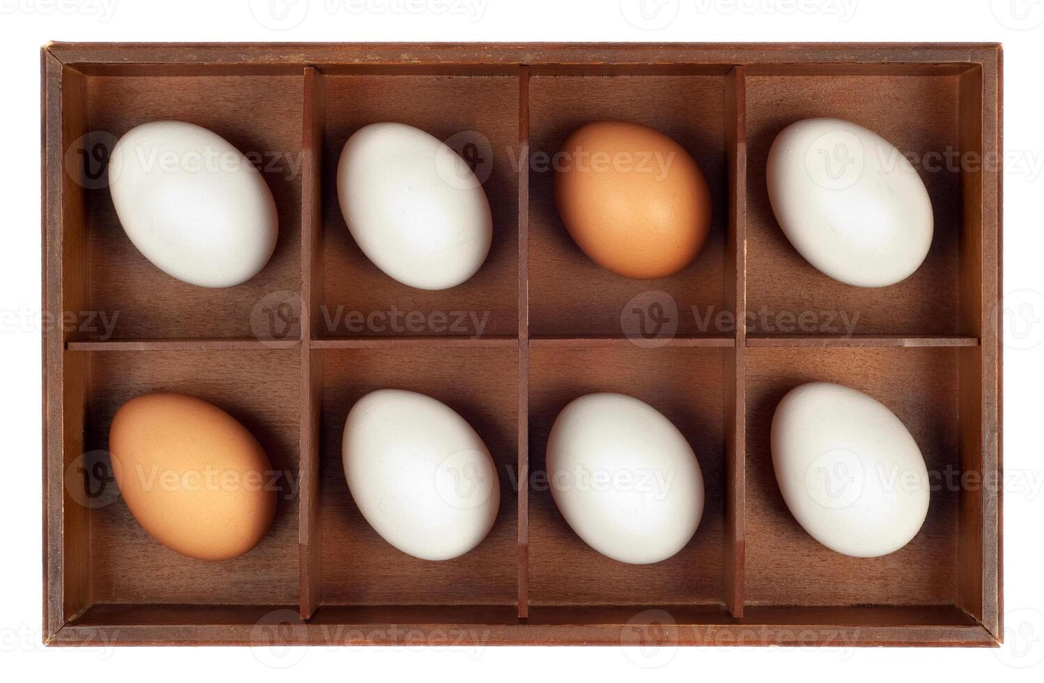 Eggs in wooden box photo