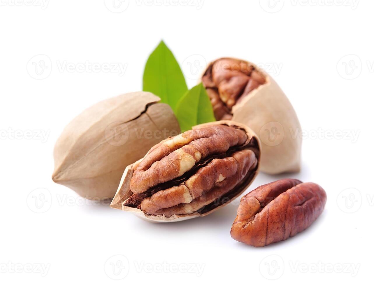 Peanuts nuts with leaves on white backgrounds photo