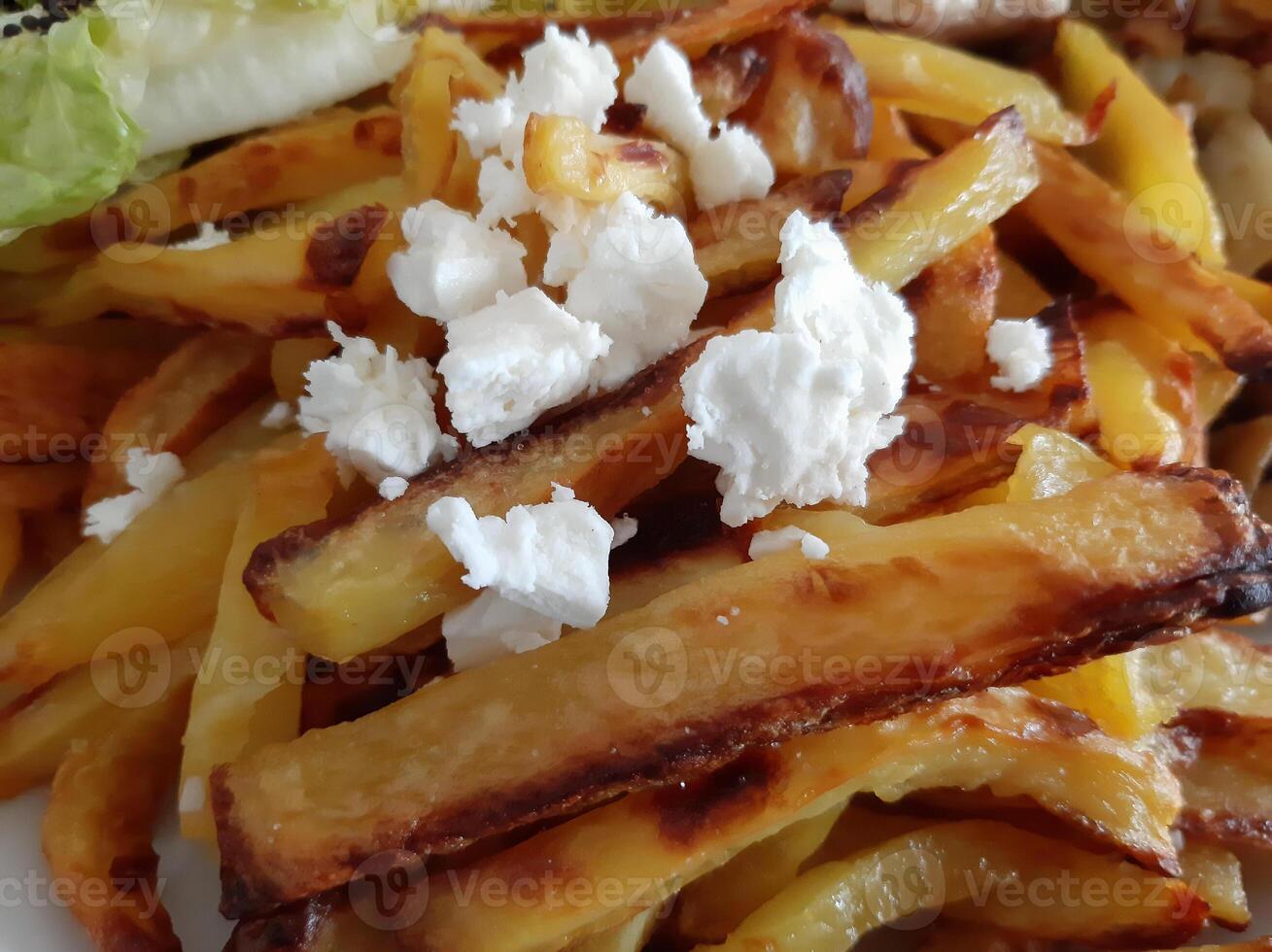 French fries served on the plate. Close up details photo