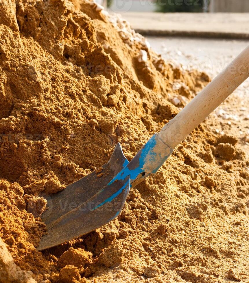 Spade and sand photo