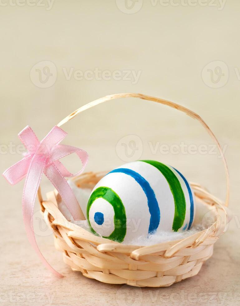 Easter egg in basket photo