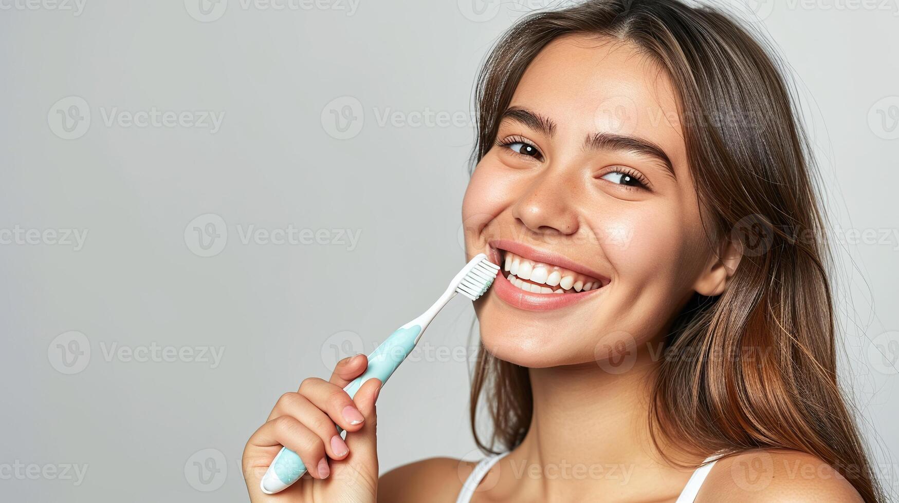 ai generado alegre joven mujer cepillos su sano dientes con un cepillo de dientes foto