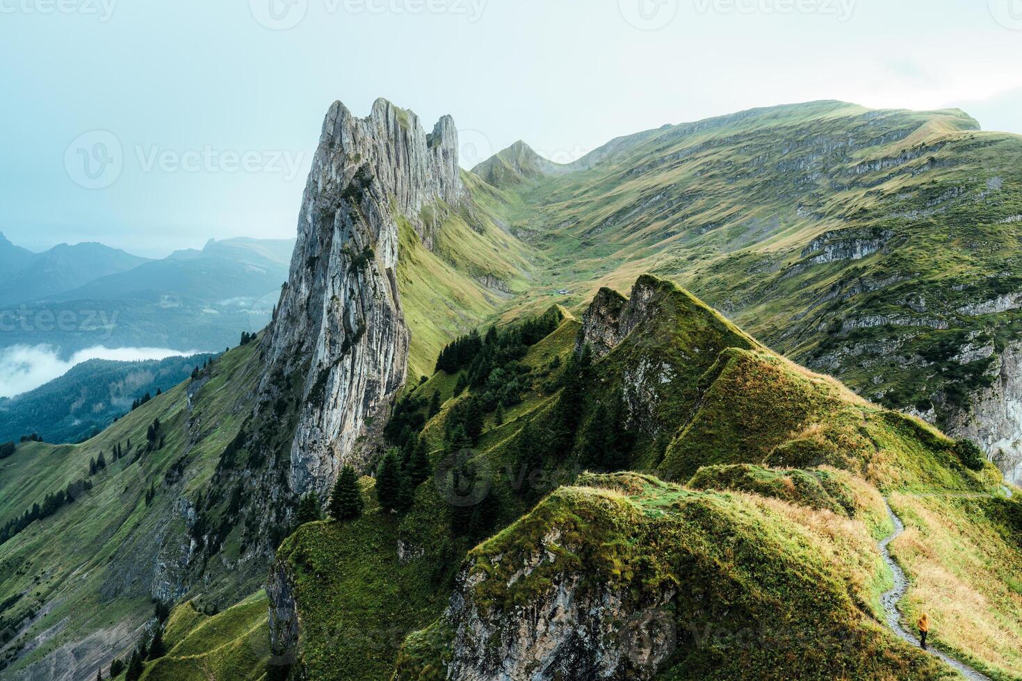 Majestic rocky mountain of Saxer Lucke in Swiss Alps during autumn at Appenzell, Switzerland photo