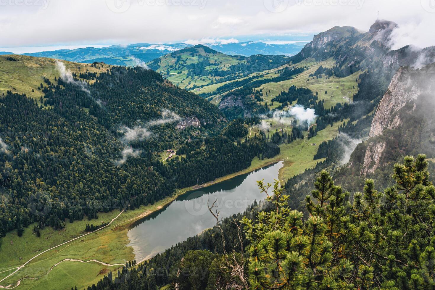 Lake Fahlensee from summit mountain in Swiss Alps during summer at Switzerland photo