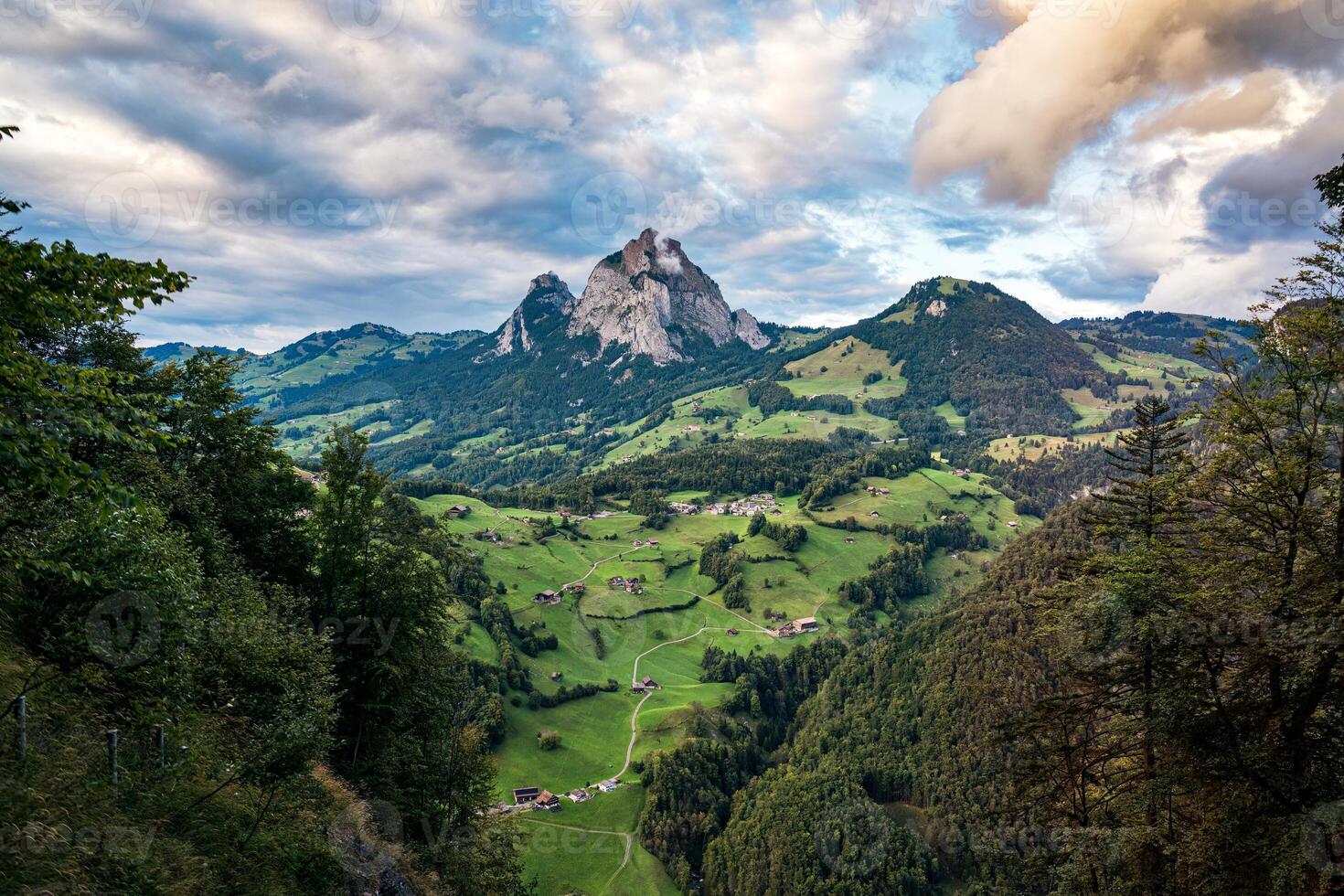 Swiss Alps Grosser Mythen mountain during on the way up to Fronalpstock by Stoos ridge railway in Switzerland photo