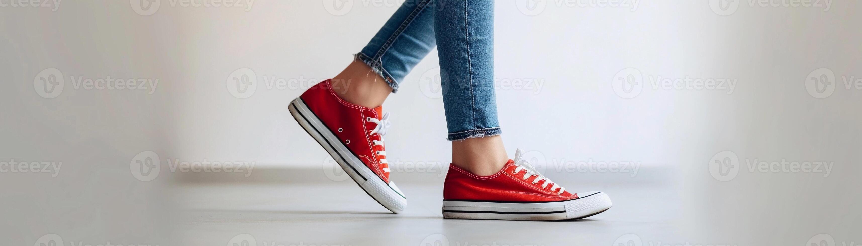 AI generated A woman's feet walking wearing red unbranded sports shoes on white background, background image, generative AI photo