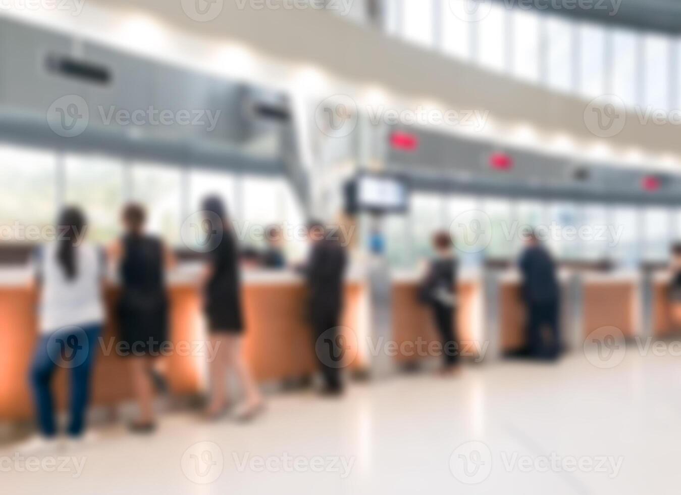 Blurred customer transaction in bank counter photo