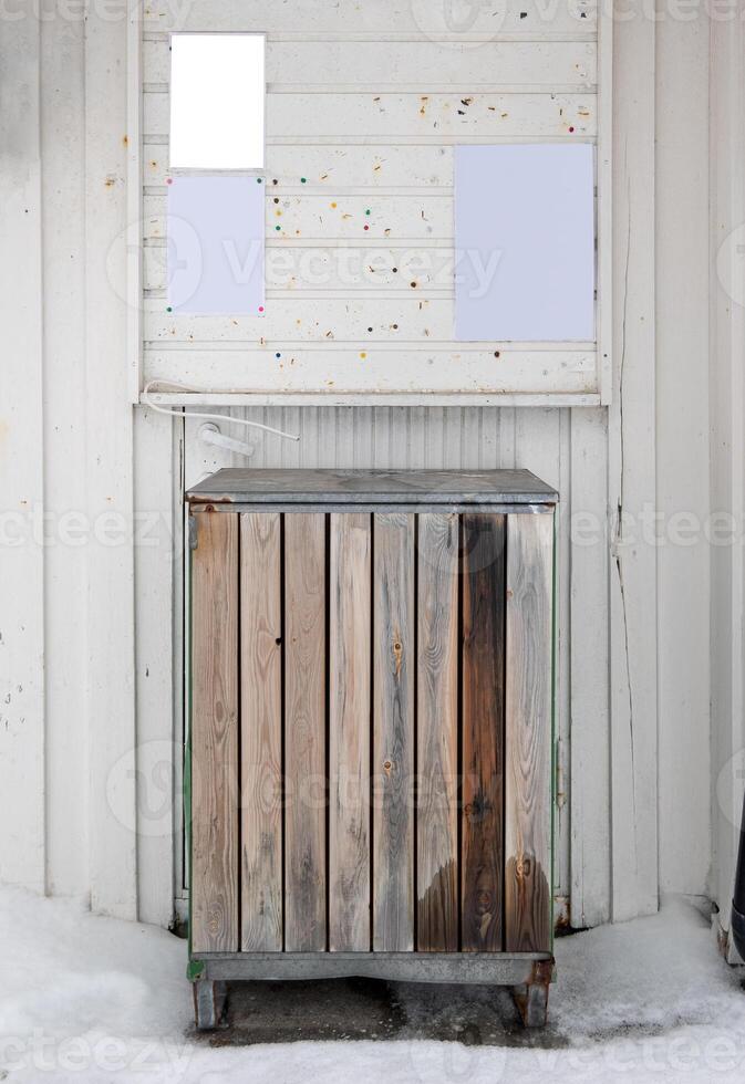 Wooden trash of timber on outside store photo