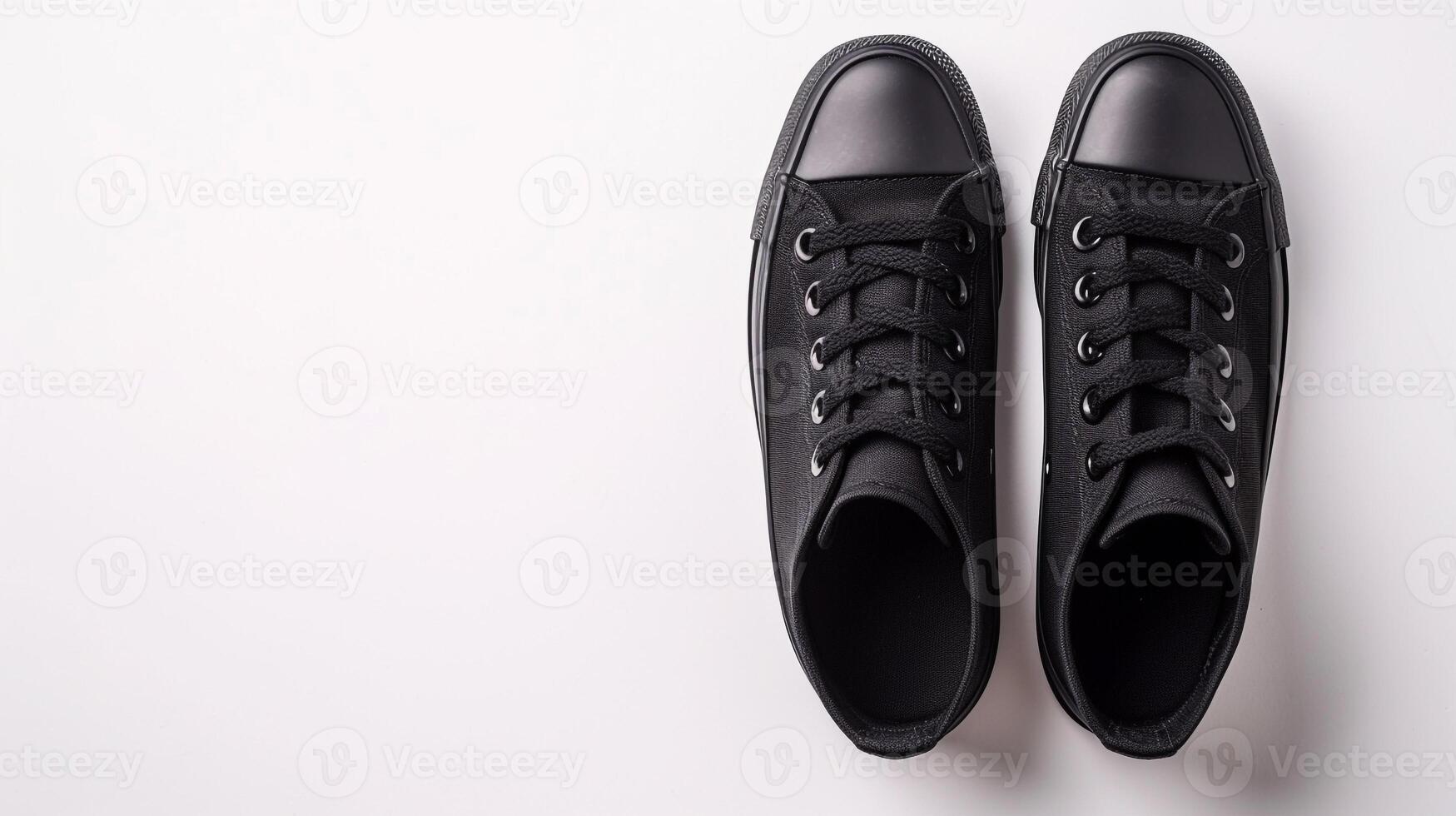 AI generated Black canvas shoes isolated on flat white background with copy space for advertisement. Generative AI photo