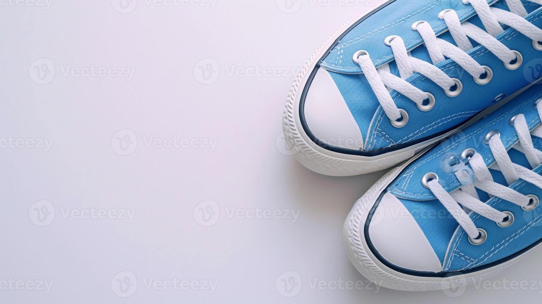 AI generated Blue canvas shoes isolated on flat white background with copy space for advertisement. Generative AI photo