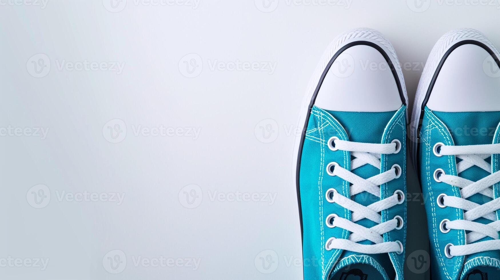 AI generated Cyan canvas shoes isolated on flat white background with copy space for advertisement. Generative AI photo