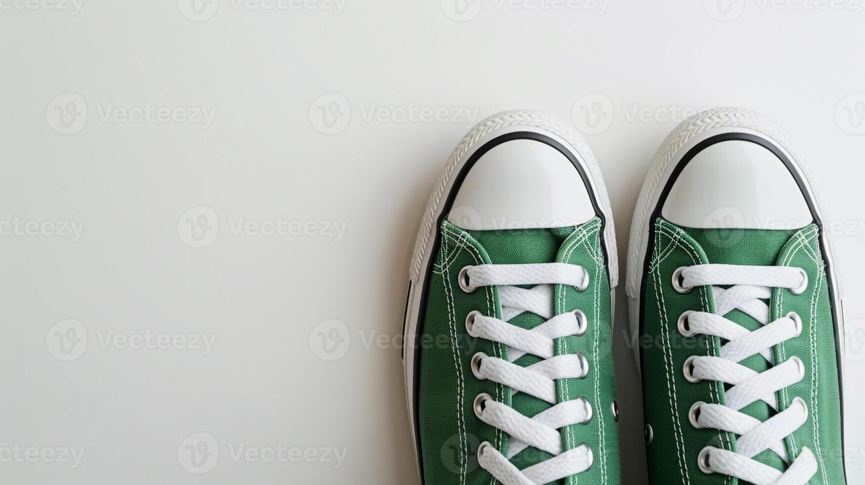 AI generated Green canvas shoes isolated on flat white background with copy space for advertisement. Generative AI photo
