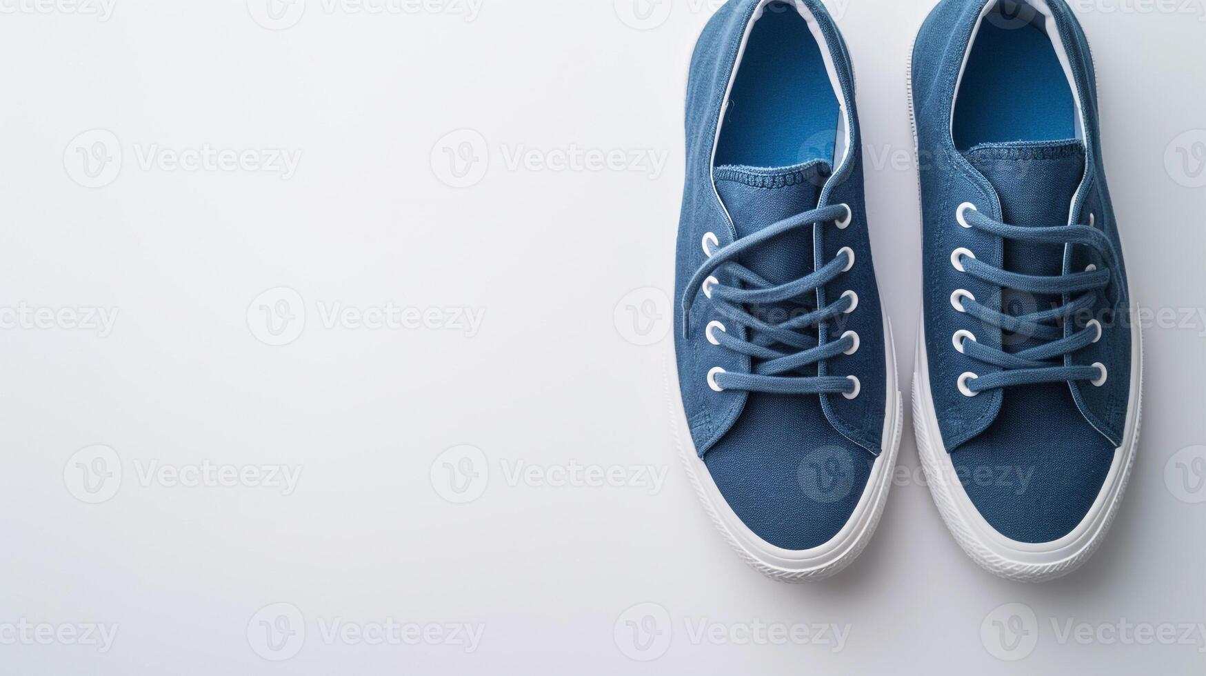 AI generated Indigo canvas shoes isolated on flat white background with copy space for advertisement. Generative AI photo