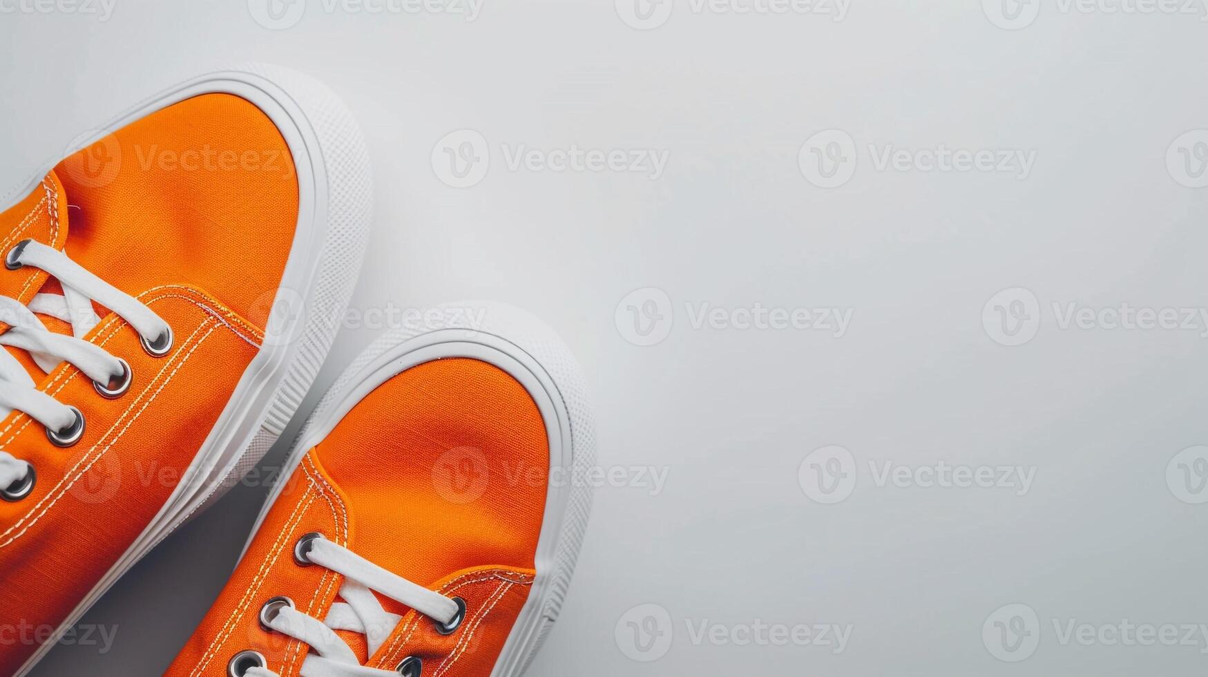 AI generated Orange canvas shoes isolated on flat white background with copy space for advertisement. Generative AI photo