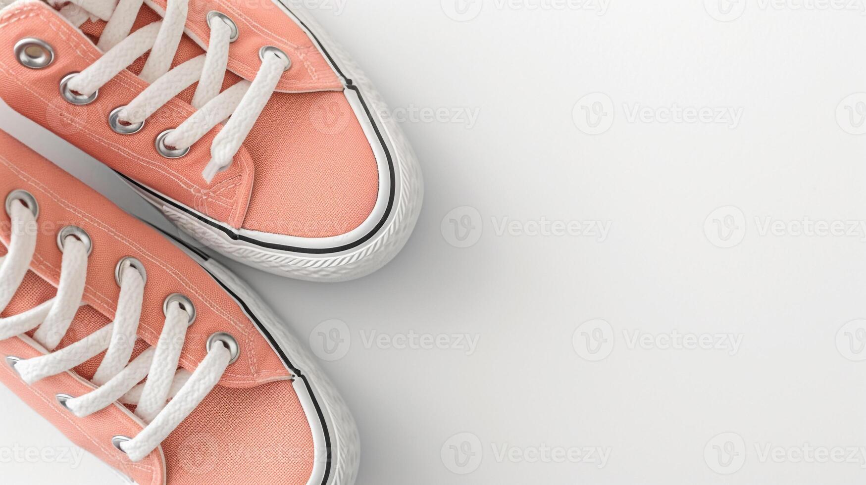 AI generated Peach canvas shoes isolated on flat white background with copy space for advertisement. Generative AI photo