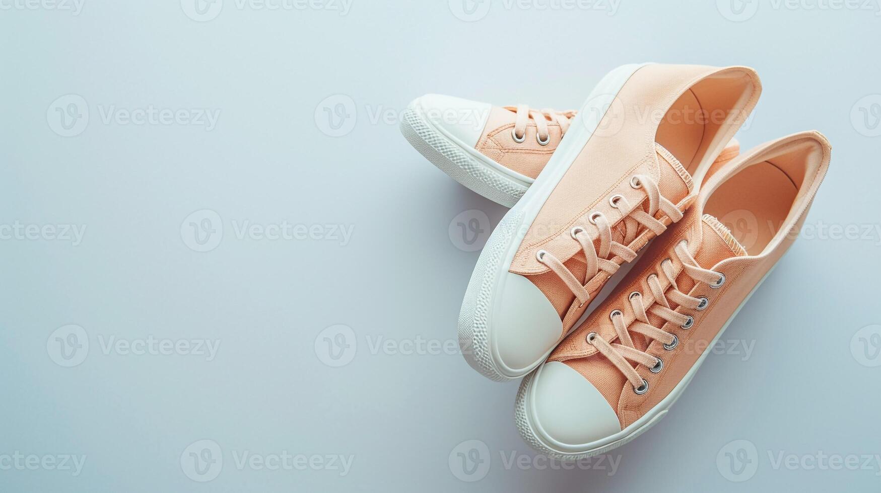 AI generated Peach canvas shoes isolated on flat white background with copy space for advertisement. Generative AI photo