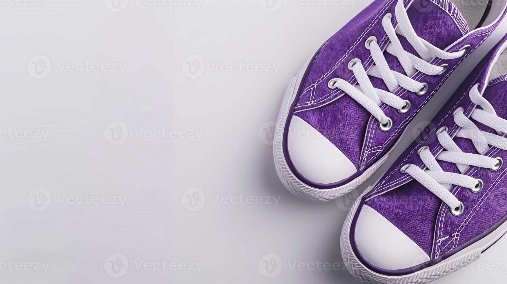 AI generated Purple canvas shoes isolated on flat white background with copy space for advertisement. Generative AI photo