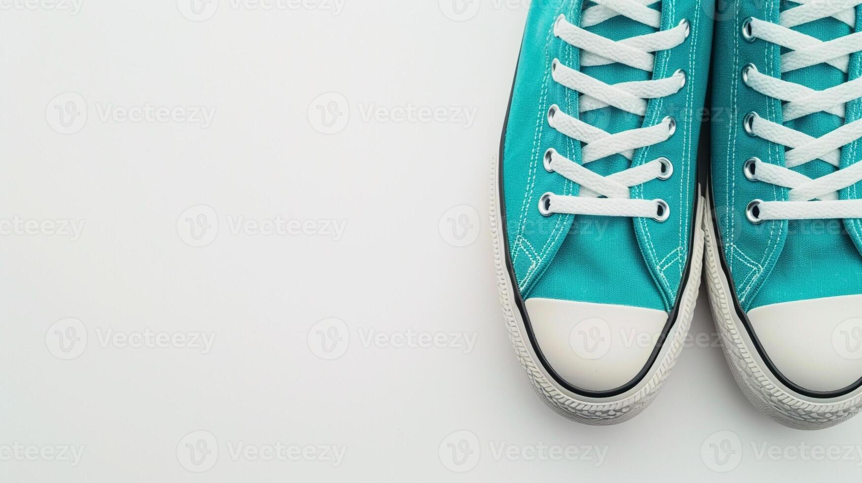 AI generated Teal canvas shoes isolated on flat white background with copy space for advertisement. Generative AI photo