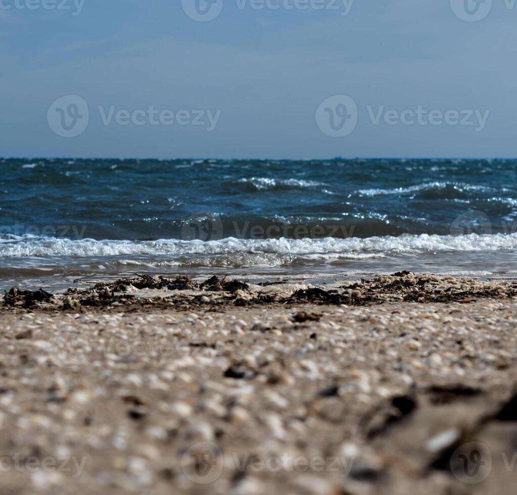 Dublin, Sandymount beach waves on sunny day photo