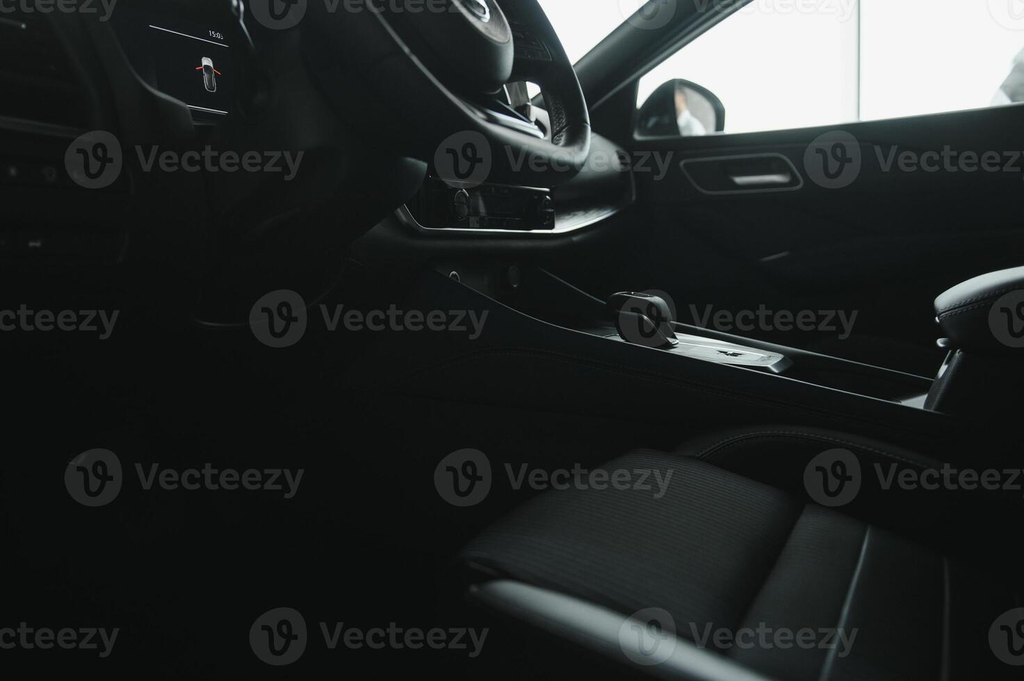 car interior. Modern car speedometer and illuminated dashboard. Luxurious car instrument cluster. Close up shot of hybrid car instrument panel photo