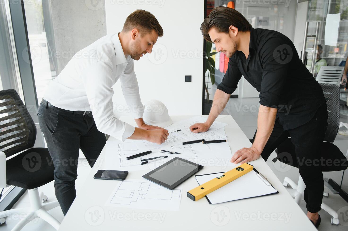 Engineers are helping to design work on blueprints and collaborate on structural analyzing of project types. photo