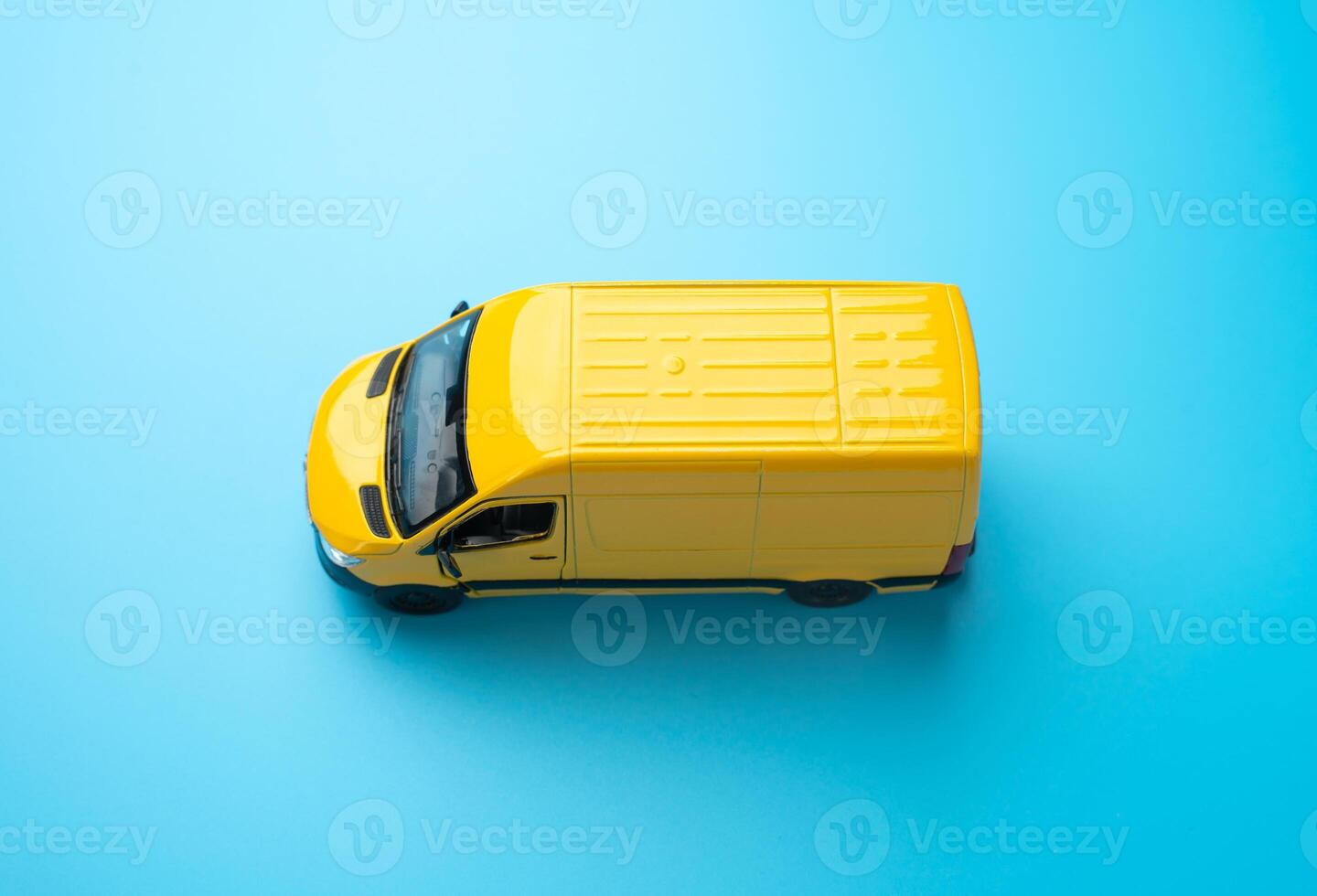 Yellow delivery van. Efficiency, speed, and reliability in transportation and logistics. Delivering goods and services. E-commerce, retail, or distribution networks. Delivery of mail and cargo. photo