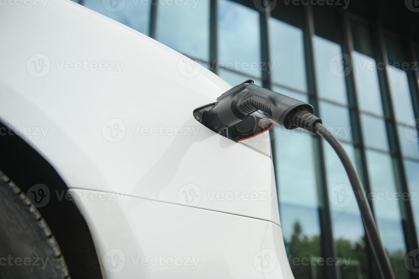 Close up image of the power socket of an electric car, charging photo