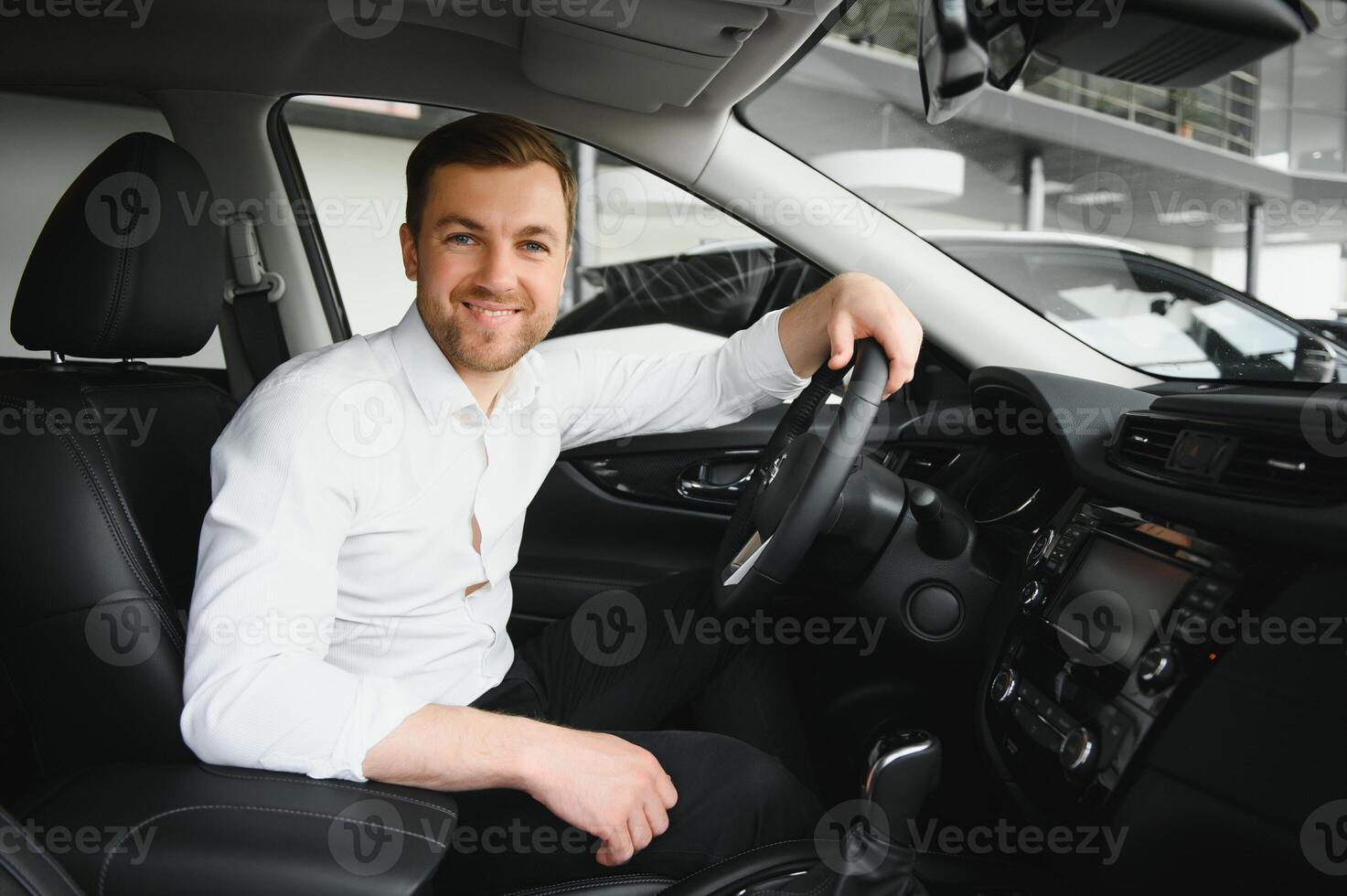 transport, vehicle and taxi concept - male driver photo