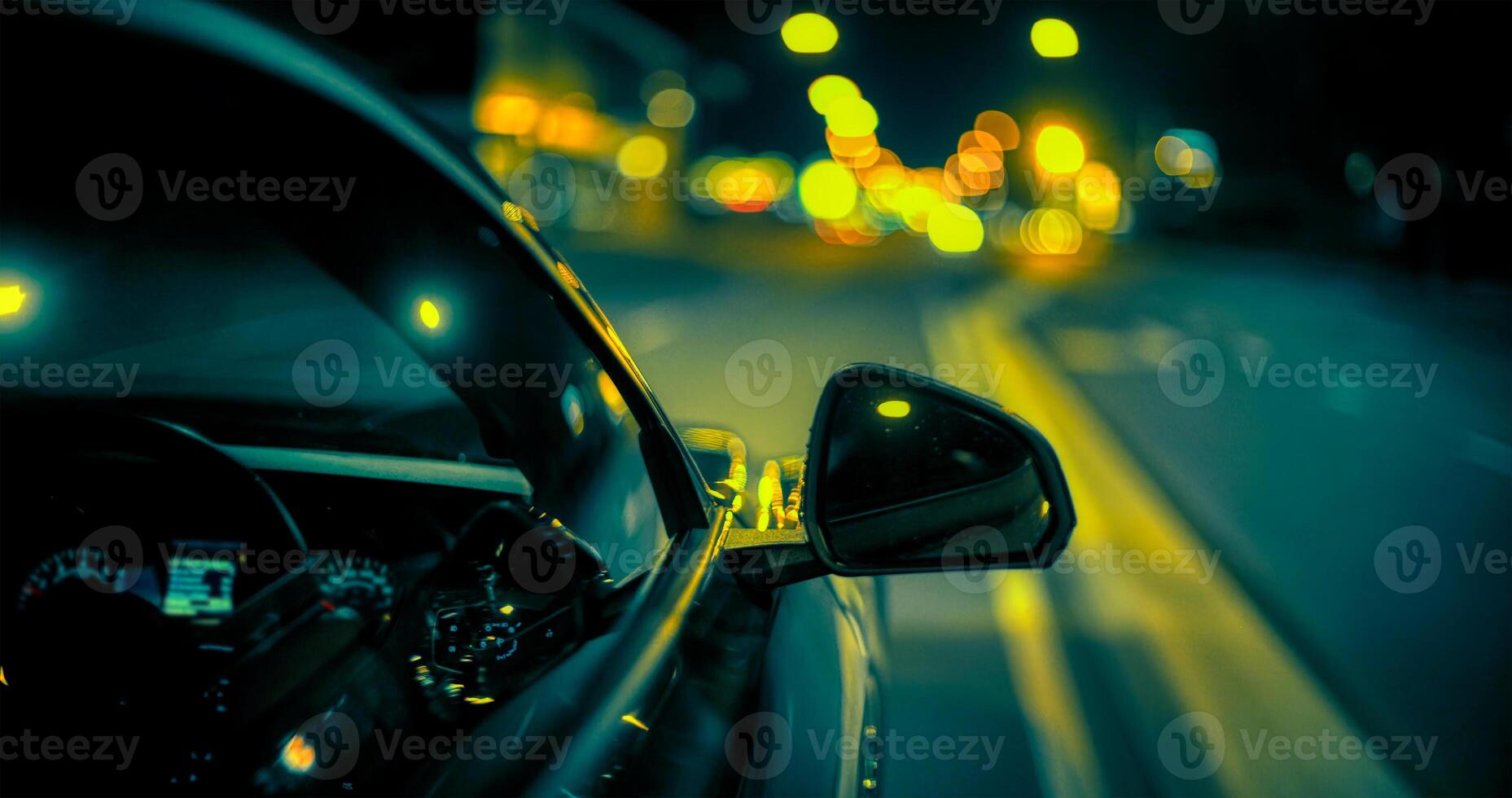 car driving on night road city, blur light traffic background photo