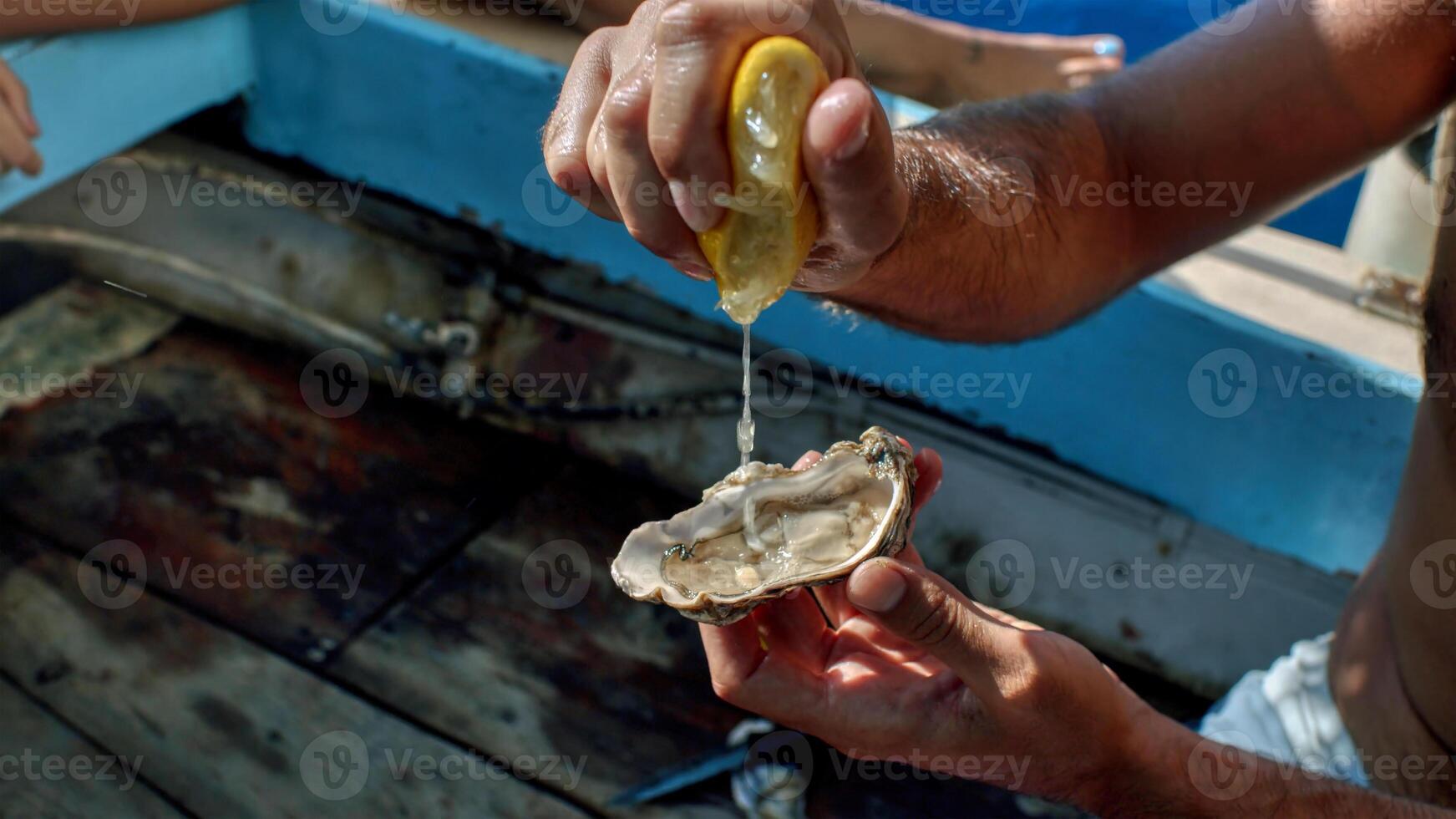 Mediterranean food. Elegant man loving gastronomy feeling wonderful while enjoying eating Mediterranean food photo