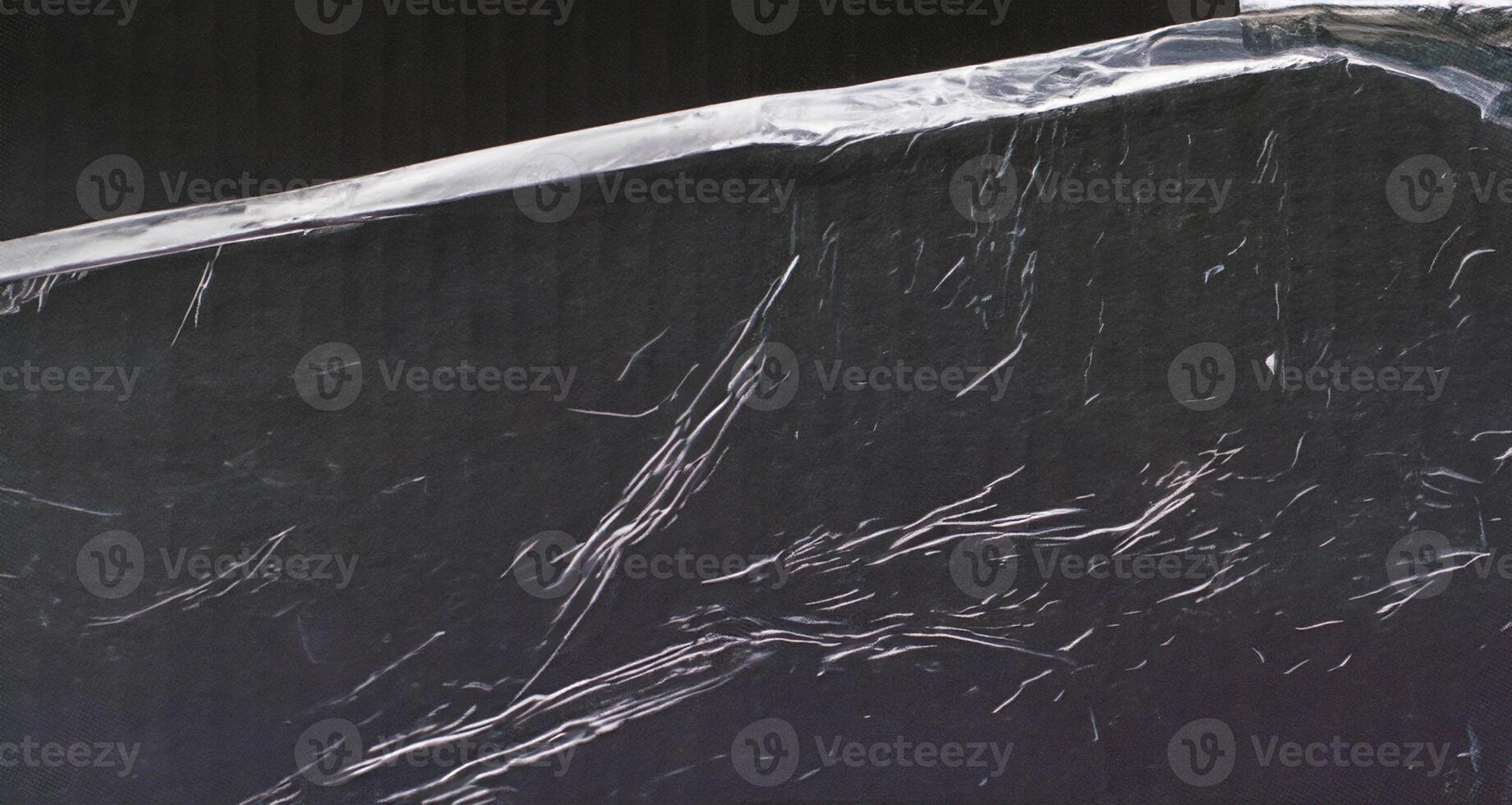 texture of pasted polyethylene on black cardboard photo