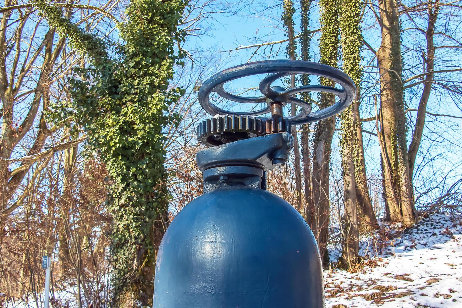 An ancient valve for water and steam. A technical monument on the slope of Mount Festung in the area of the Hohensalzburg fortress. photo