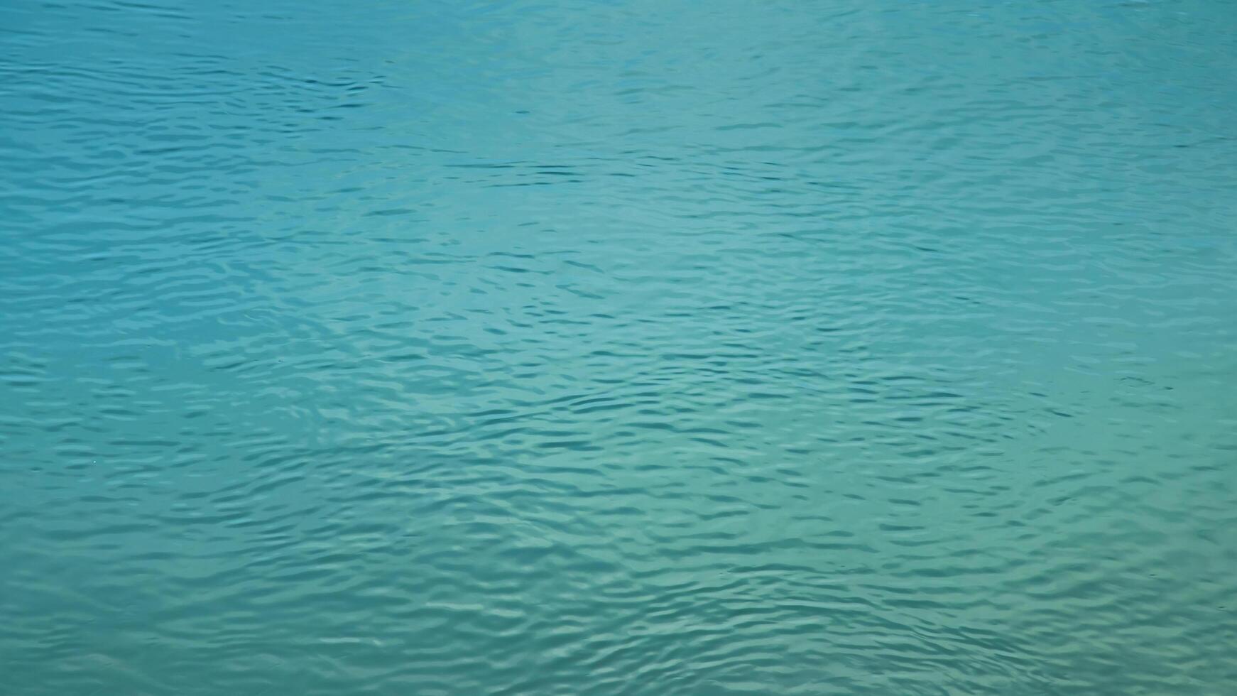 Background of the water surface of the Salzach river. Texture of water of a mountain river. photo