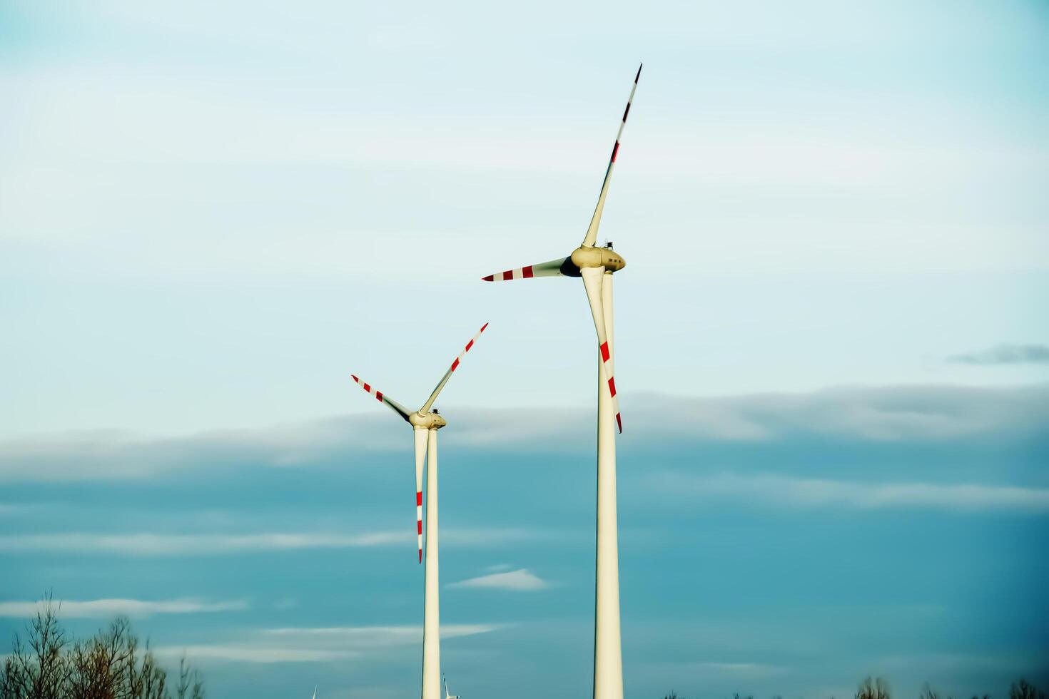 Wind farm park next to a road in Austria in sunny weather. photo