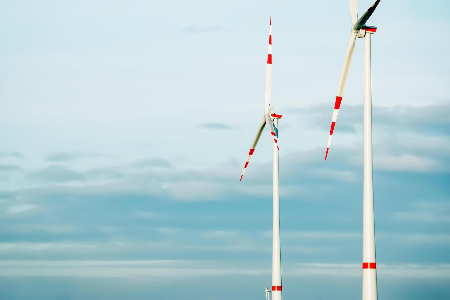 Wind farm park next to a road in Austria in sunny weather. photo