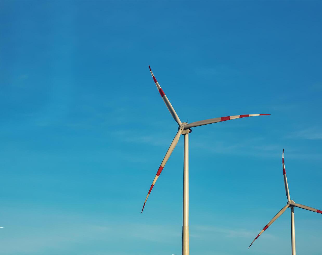 Wind farm park next to a road in Austria in sunny weather. photo