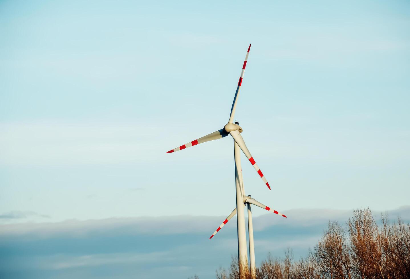 Wind farm park next to a road in Austria in sunny weather. photo
