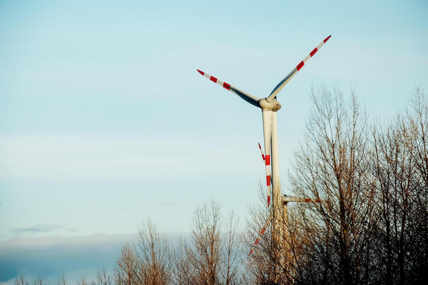 Wind farm park next to a road in Austria in sunny weather. photo