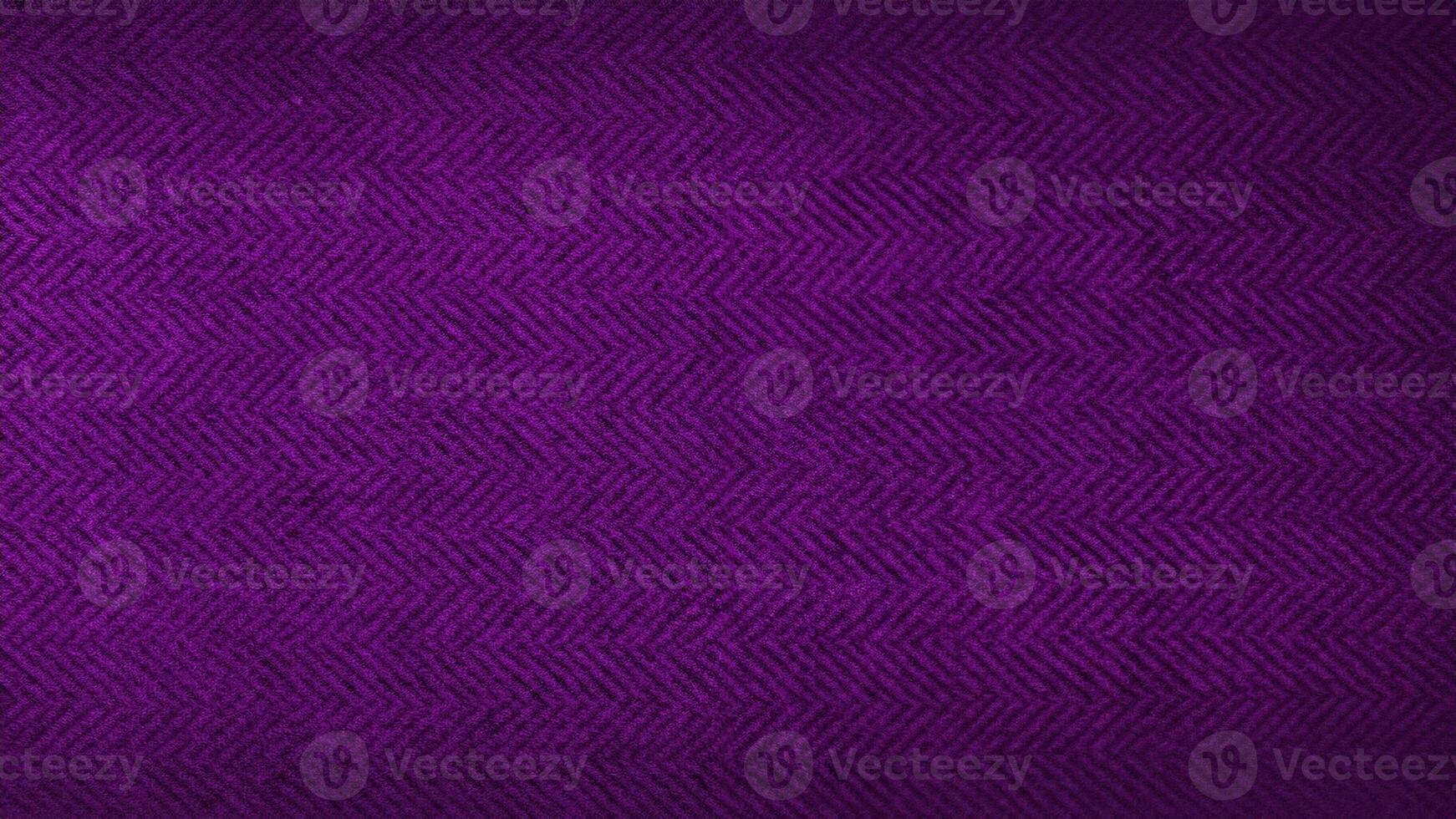 purple or violet herringbone pattern fabric, texture background. violet tweed pattern, weaving, textile material. close up canvas background. luxury concept background. photo