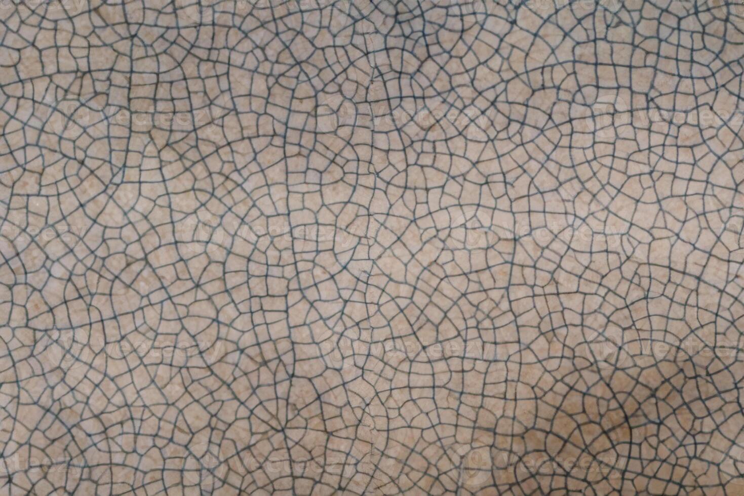 Cracked old ceramic texture background photo
