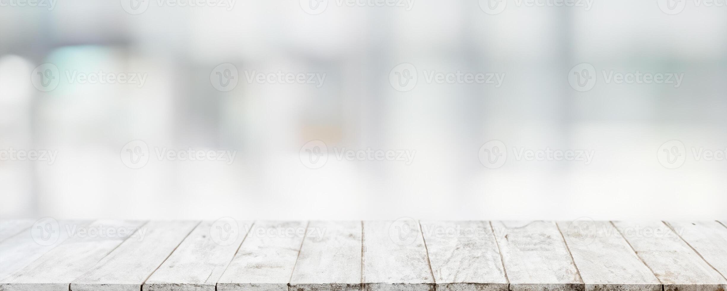 Empty wood table top and blur glass window wall building banner mock up abstract background - can used for display or montage your products. photo