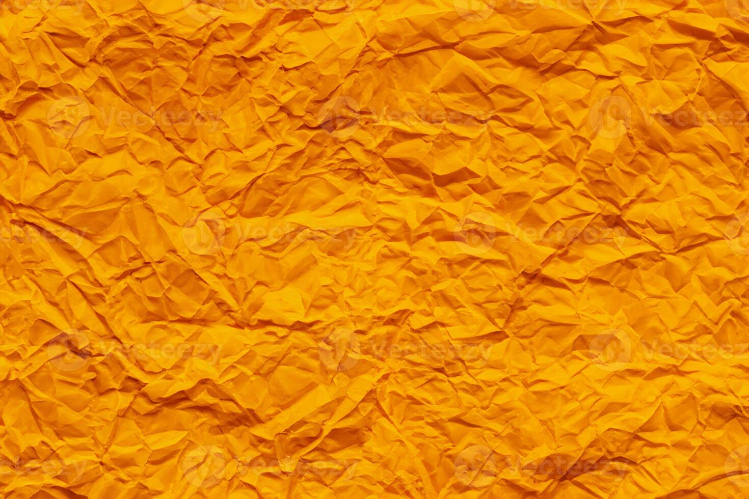 Orange crumpled paper background photo