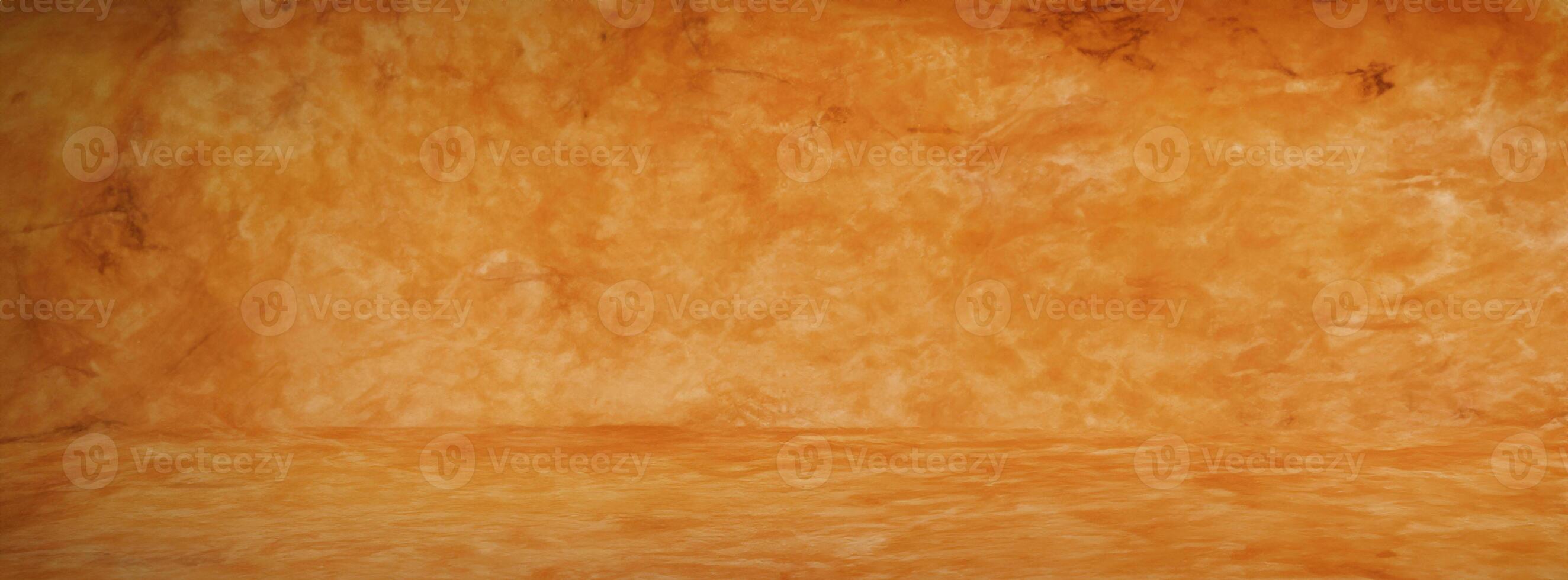 Horizontal yellow and orange grunge texture cement or concrete wall banner, blank studio background photo