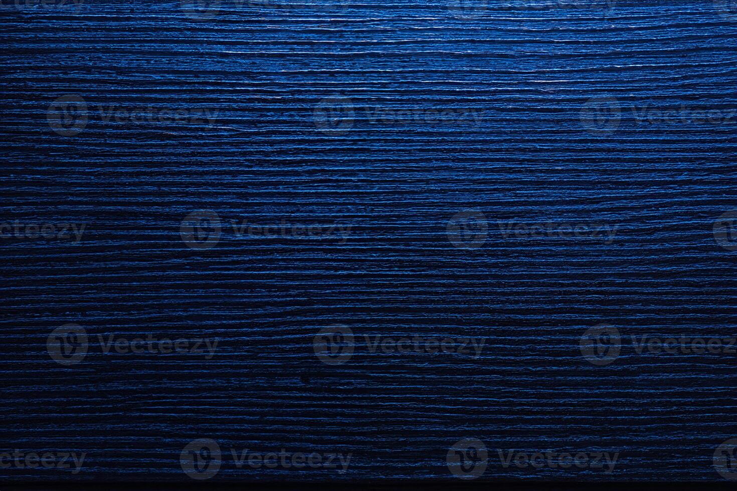 Dark abstract background of wooden, color of phantom blue. photo