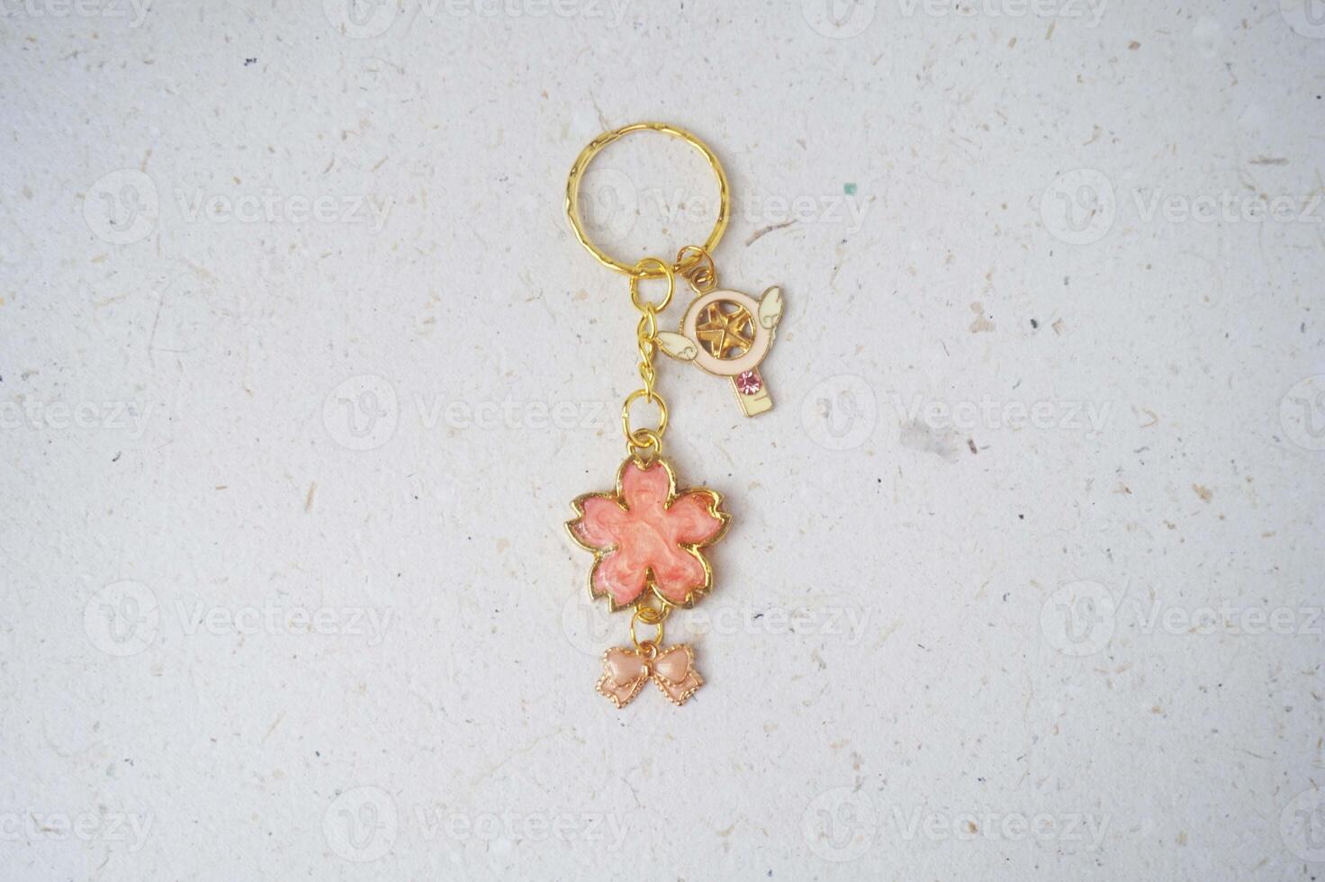 Colorful key chain made of resin and clay on a white background. Colorful key chain photo