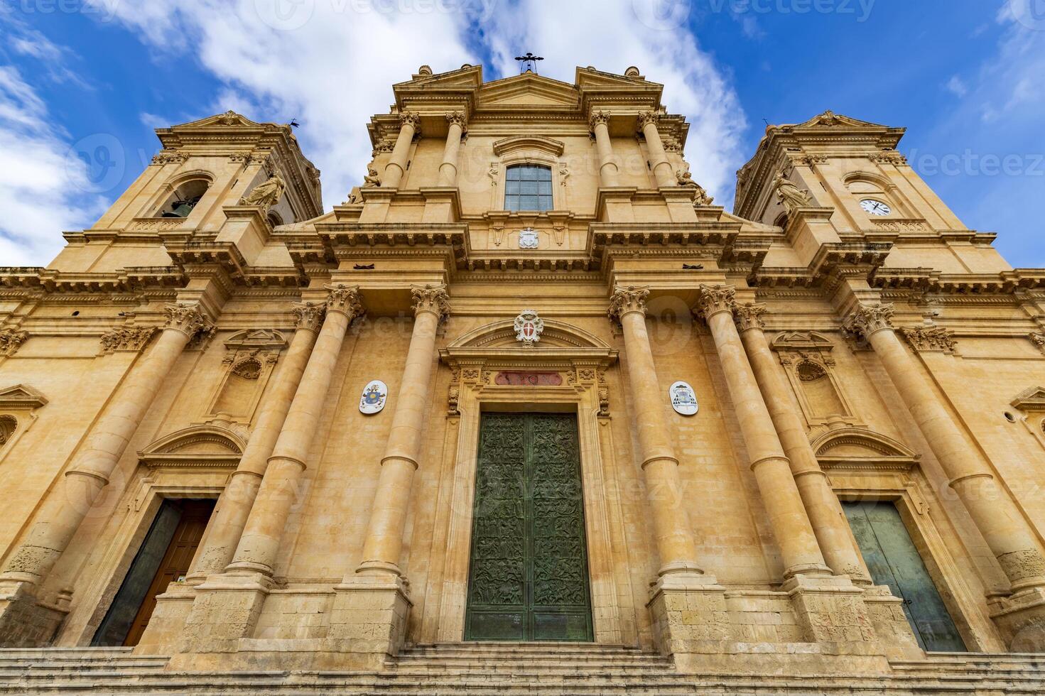 The facade of the Noto Cathedral is a masterpiece of the Sicilian Baroque and a significant landmark. photo