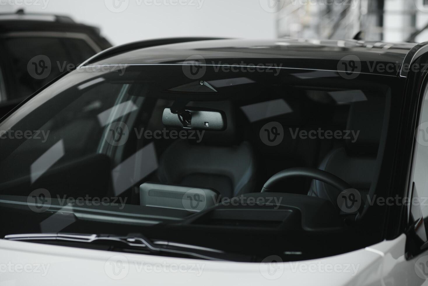 car interior. Modern car speedometer and illuminated dashboard. Luxurious car instrument cluster. Close up shot of hybrid car instrument panel photo