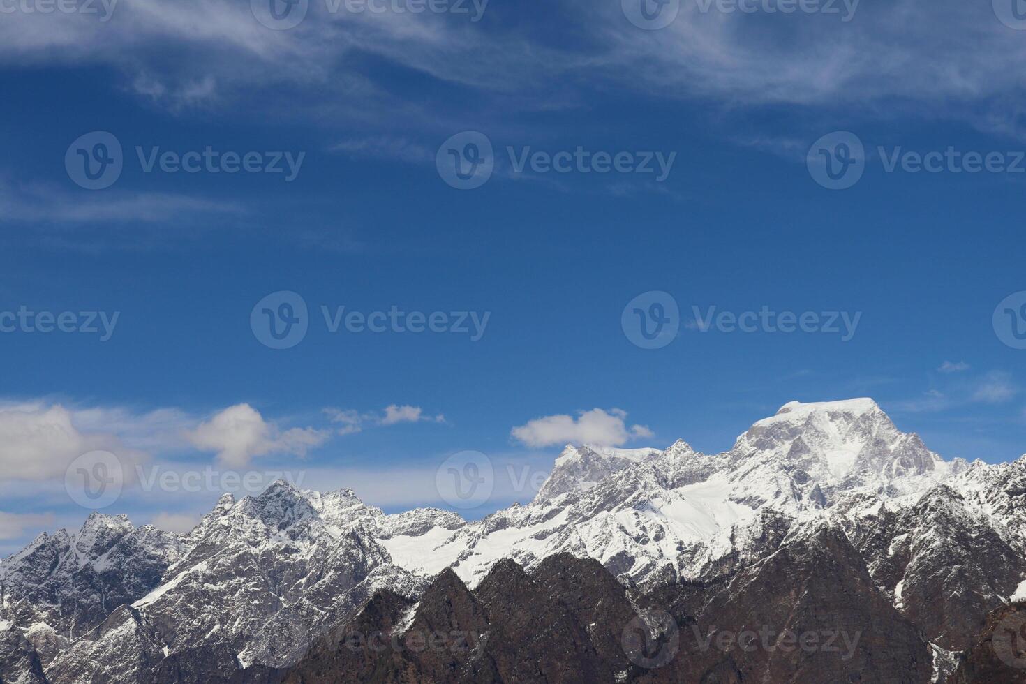 Snow on the mountain peak in Auli Ukkarakhand India photo